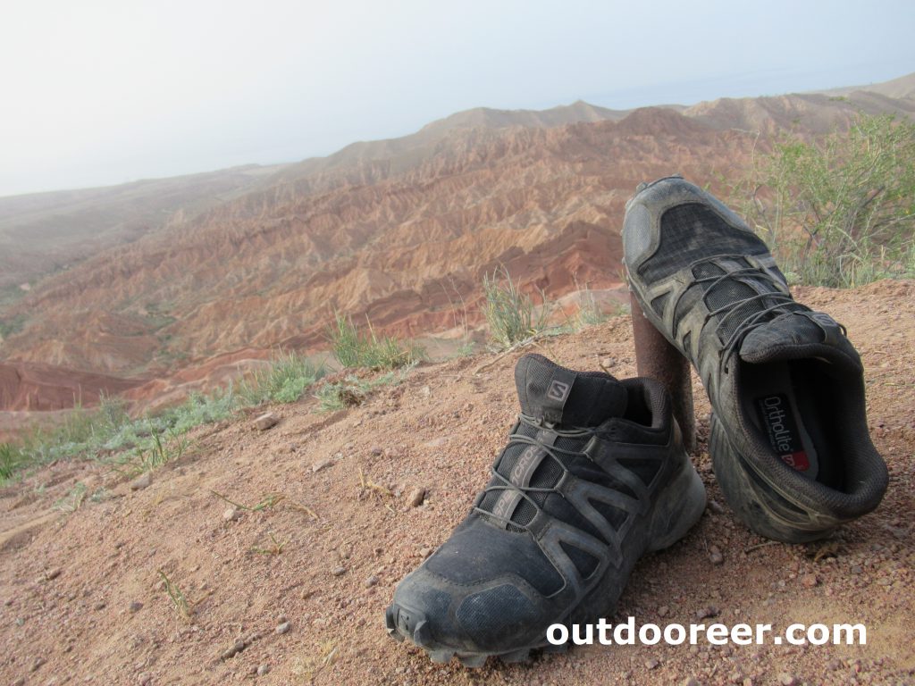 Salomon trekking shoes vegan friendly label on Kazakhstan landscape