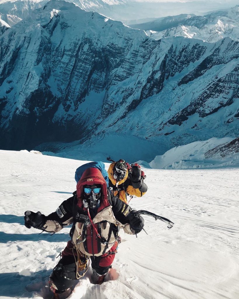 Black Diamond Cobra Ice tool used while climbing a mountain